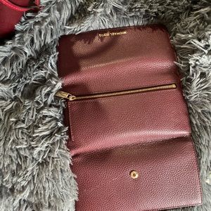 Selling Michael Kors purse and matching wallet.